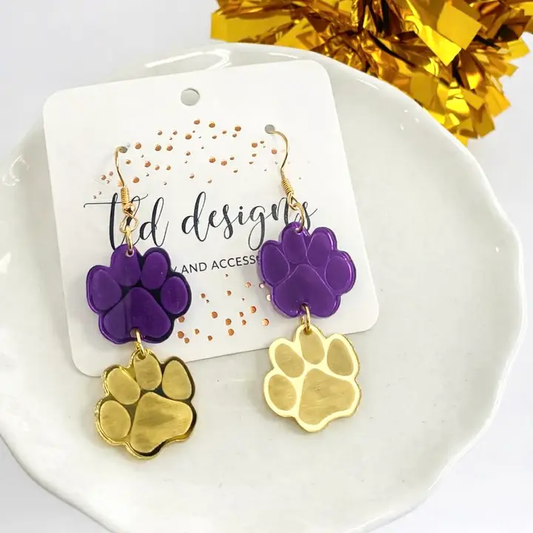 Purple and gold stacked paw print acrylic drop earrings with hook ear wires